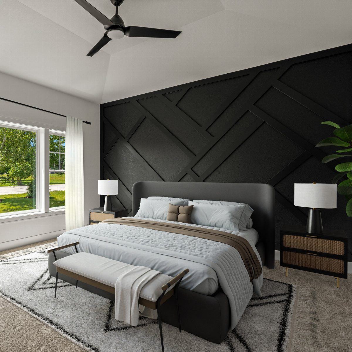 Bedroom with a black geometric paneled accent wall and modern grey bedding.