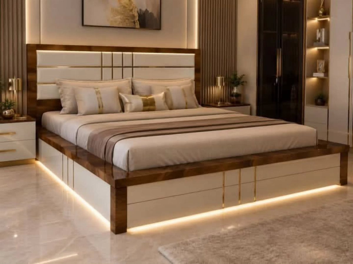 Modern bed with white built-in storage drawers and warm under-bed LED lighting.