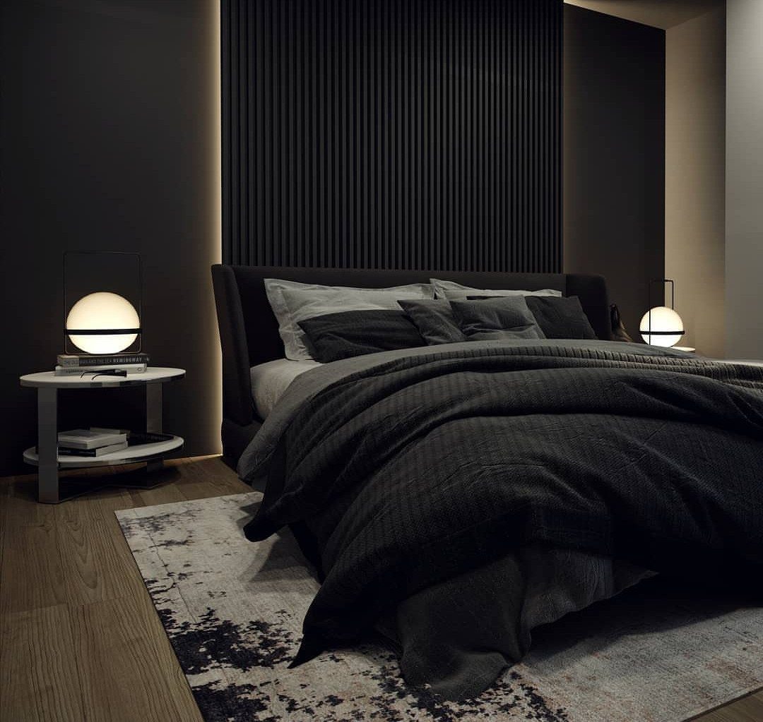 Modern bedroom with dark grey walls, black slatted feature wall, and charcoal bedding.