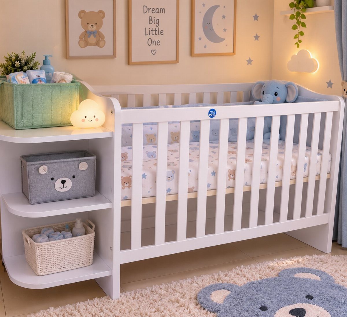 White baby crib with blue bedding in a nursery with blue and green accents