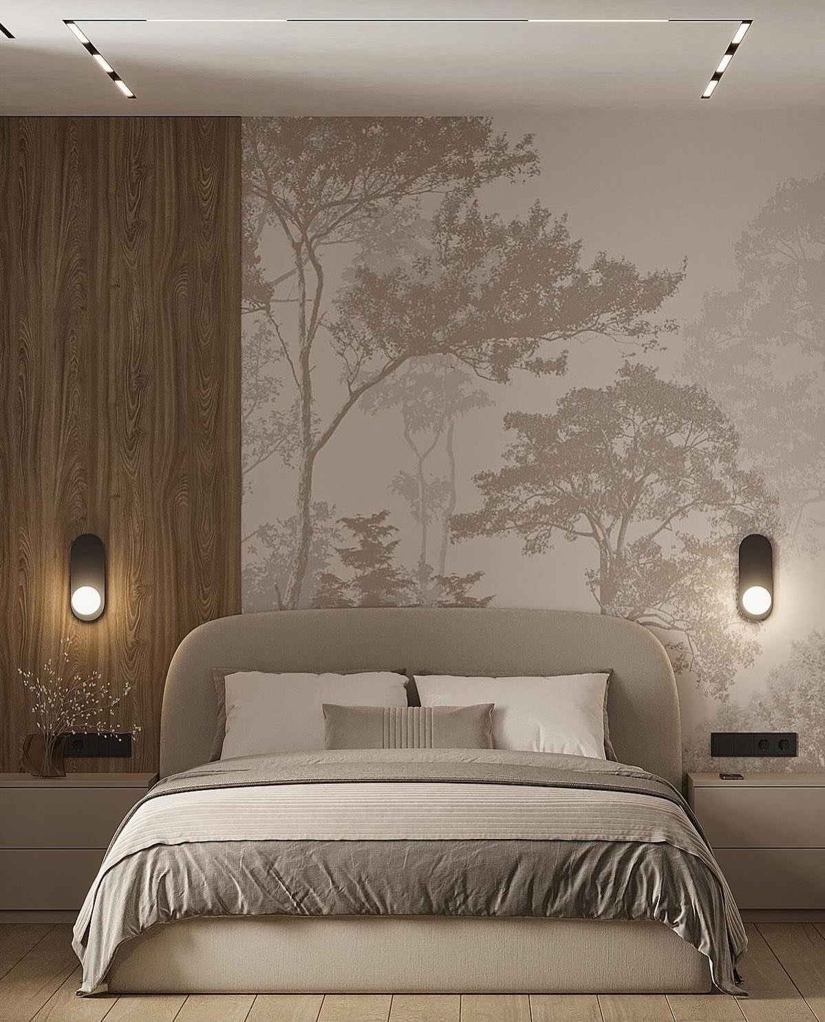 Bedroom with a muted tree mural and wood paneling behind a beige bed