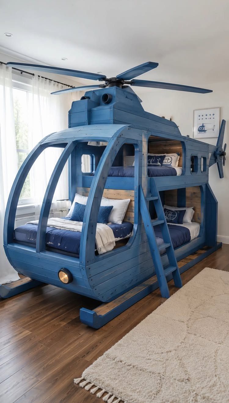 Blue helicopter shaped bunk bed with rotor blades in a child's bedroom
