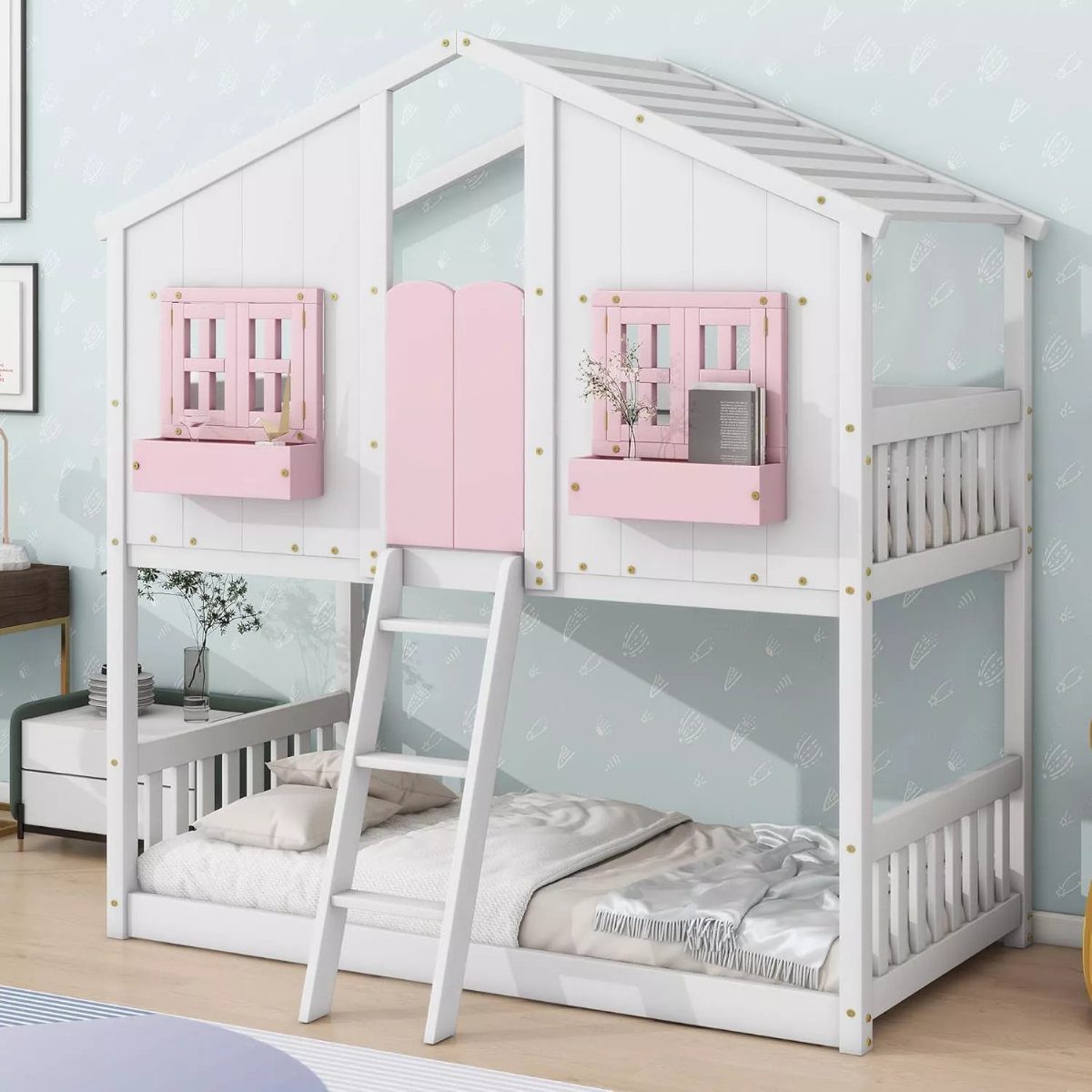 White house-shaped bunk bed with pink shutters and a white wooden ladder.
