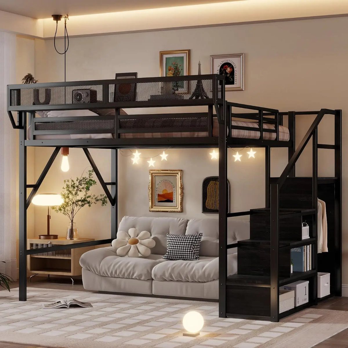 Black metal loft bed with a cozy gray sofa and fairy lights underneath.