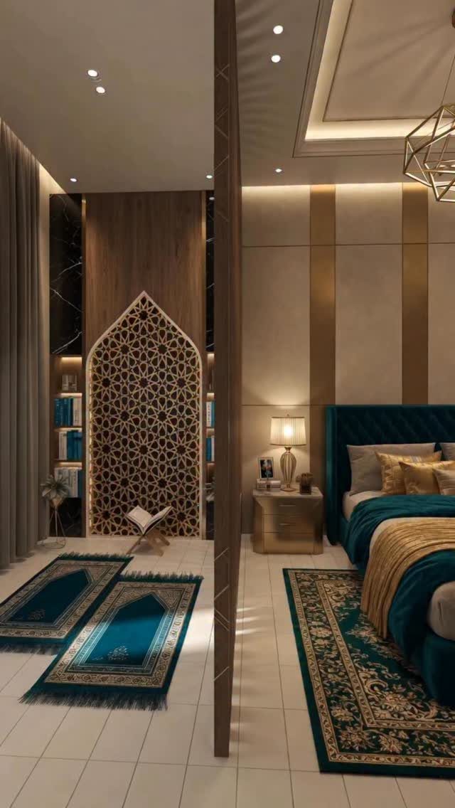 Teal and gold patterned luxury rugs in a modern bedroom with velvet furniture.