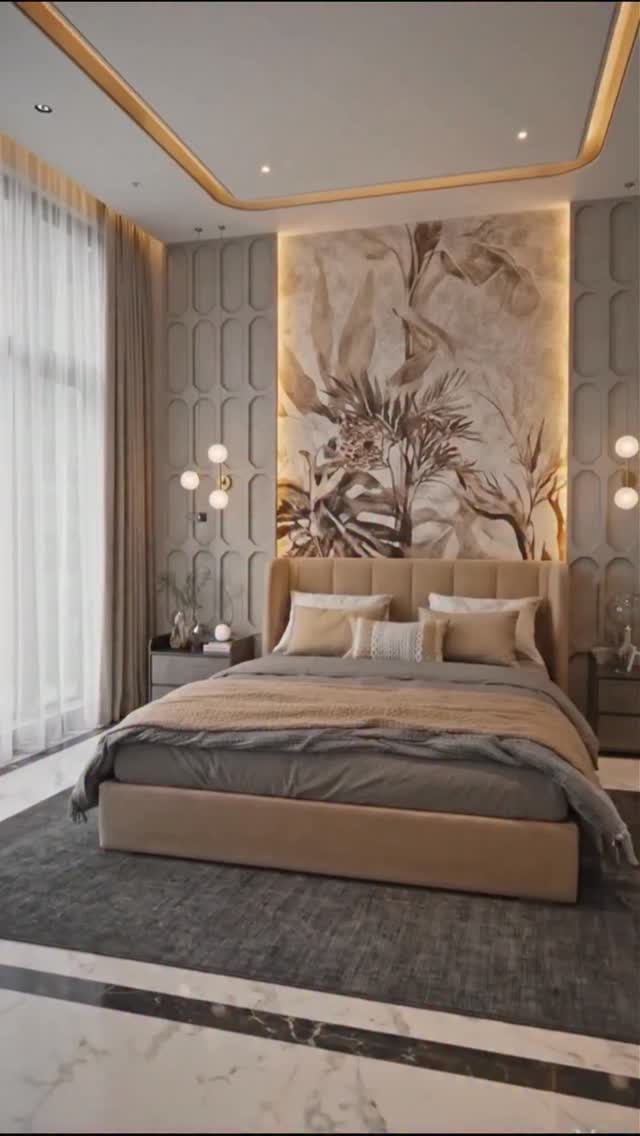 Tan upholstered platform bed in a modern bedroom with a botanical wall mural.