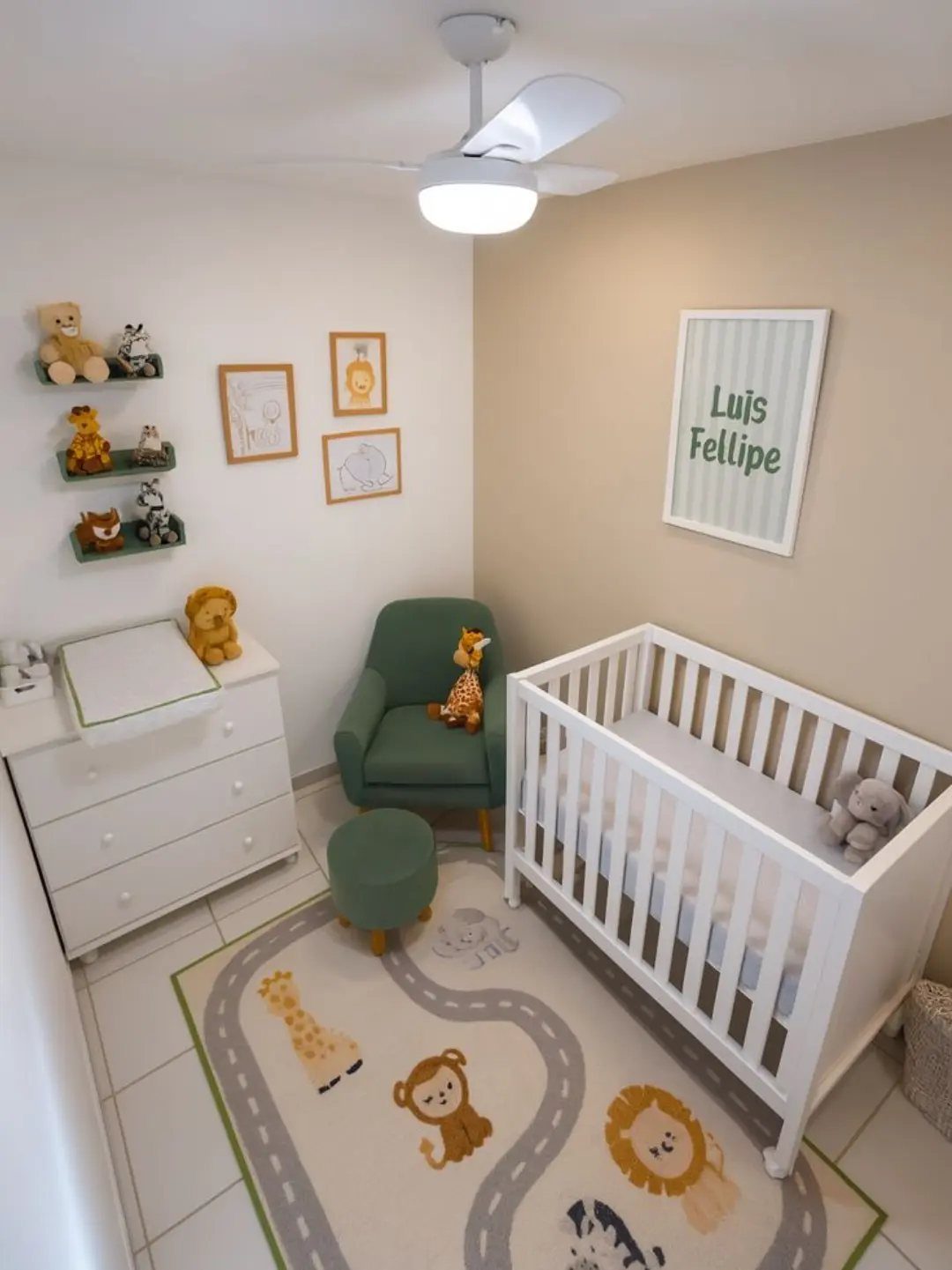 Nursery with beige walls, white crib, green armchair, and animal print rug.