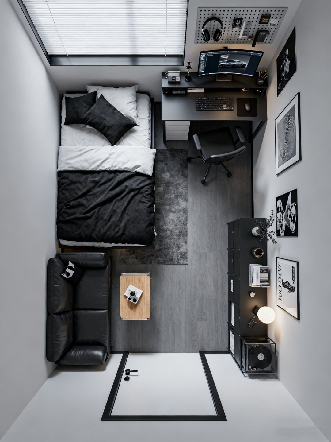 Small bedroom and office with black furniture, a bed, and a computer desk.
