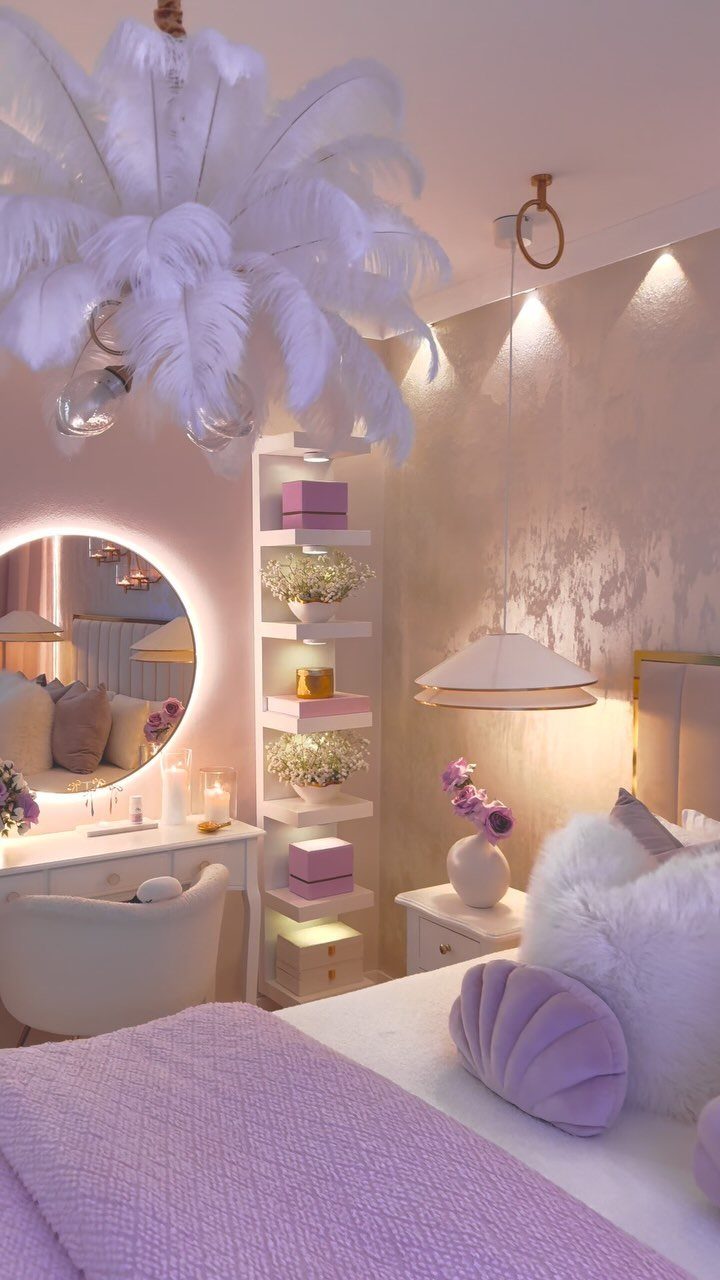Luxurious bedroom with pink textured walls, purple bedding, and a white feather chandelier.