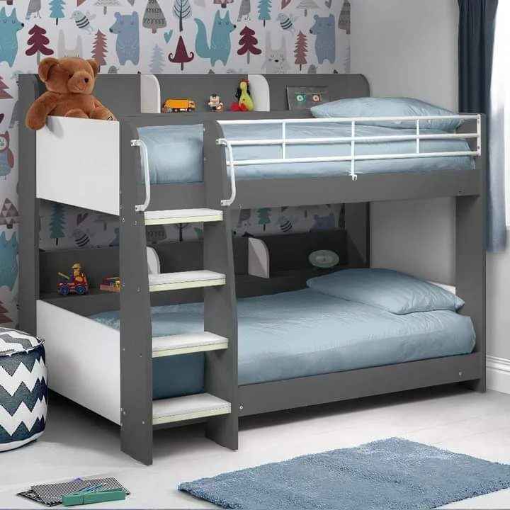 Grey and white bunk bed with a straight ladder and blue bedding.
