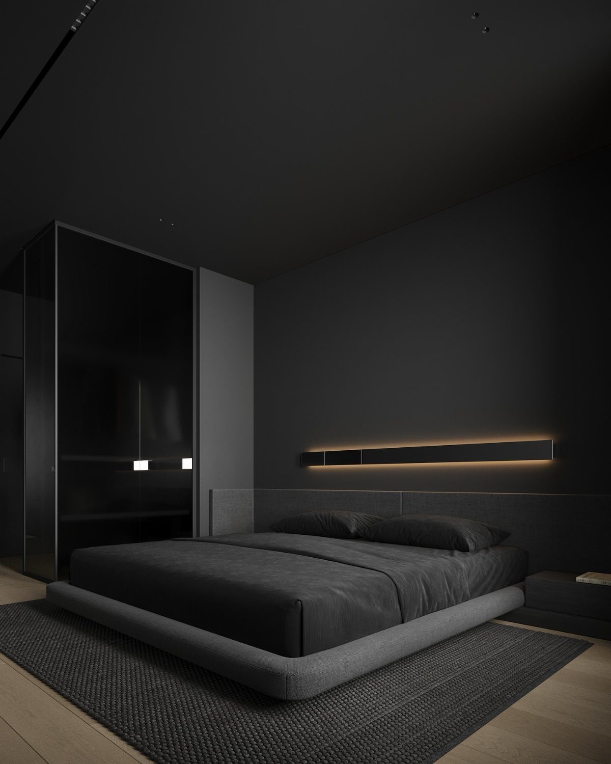 Modern bedroom with dark charcoal gray walls, ceiling, and a low-profile bed.